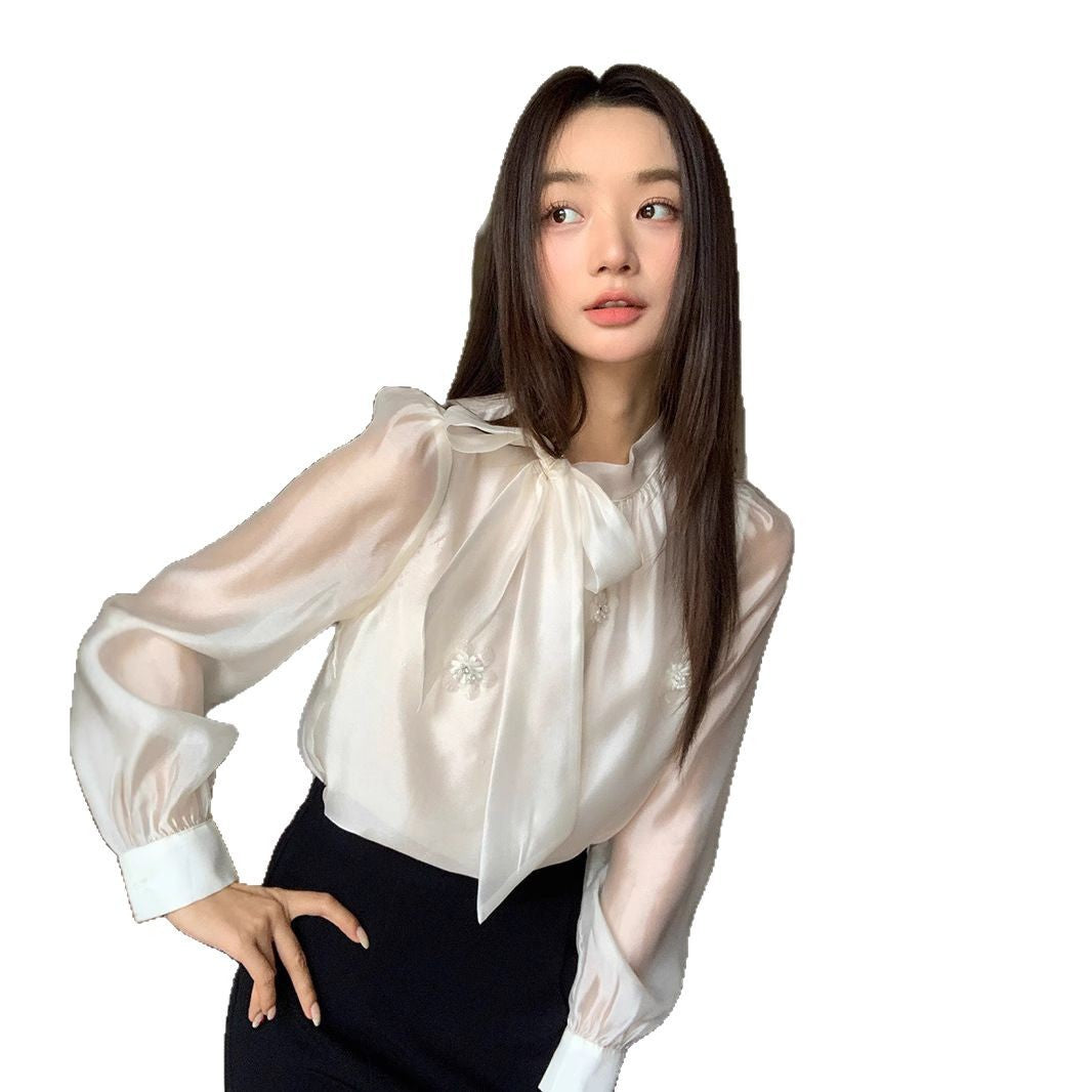 パフスリーブビーズシャツ